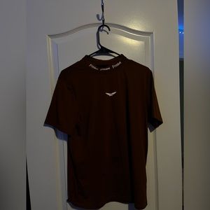 Brown with bird design tee shirt with collar size small